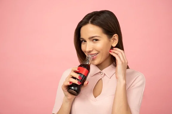 girl drinking coke